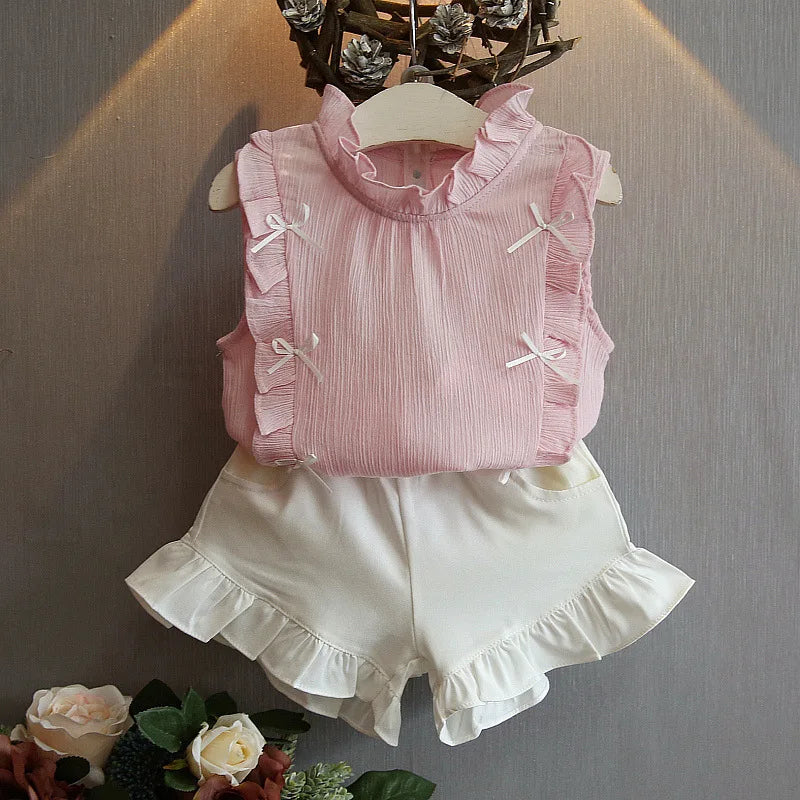 Ensemble 2 pièces pour bébé fille - Robe à col rond imprimé nœud et volants + chapeau - Idéal pour les nouveau-nés de 0 à 9 mois